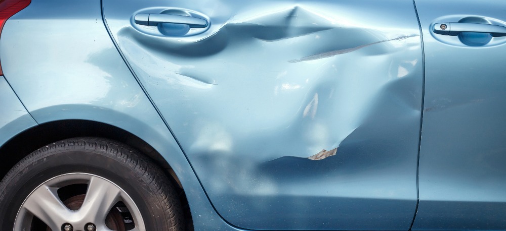 Blue car with damaged frame